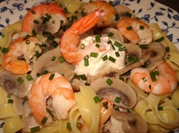 Crevettes roses � la normande sur lit de tagliatelles